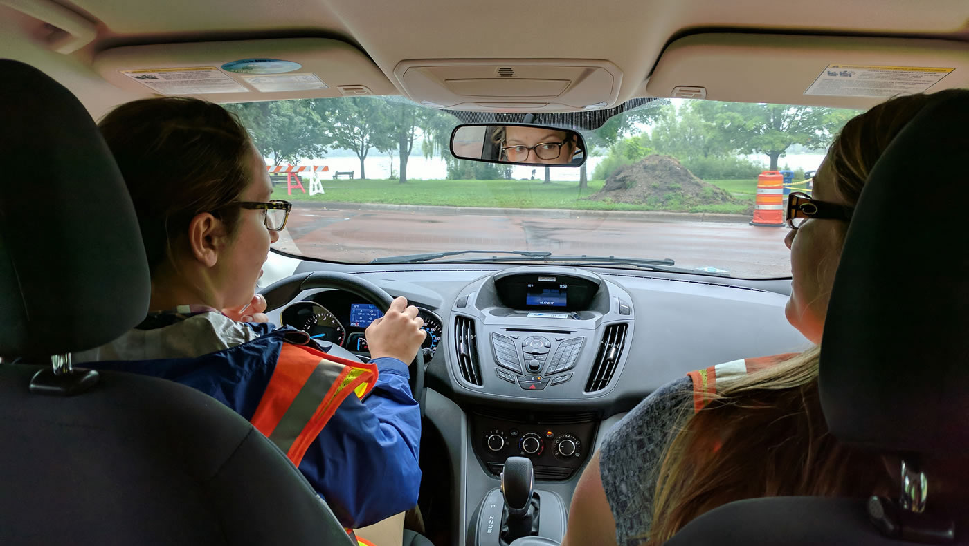 City of Minneapolis erosion monitoring interns driving to a construction site.