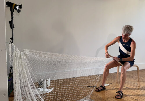 Artist Victoria Bradford Styrbicki making a net.